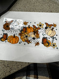 Pumpkins, butterflies, flowers