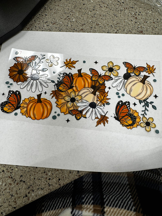 Pumpkins, butterflies, flowers