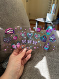 Teal skulls purple bows on suckers lips