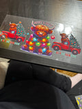 Christmas cow with lights and truck