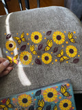 Sunflowers butterflies brown leaves