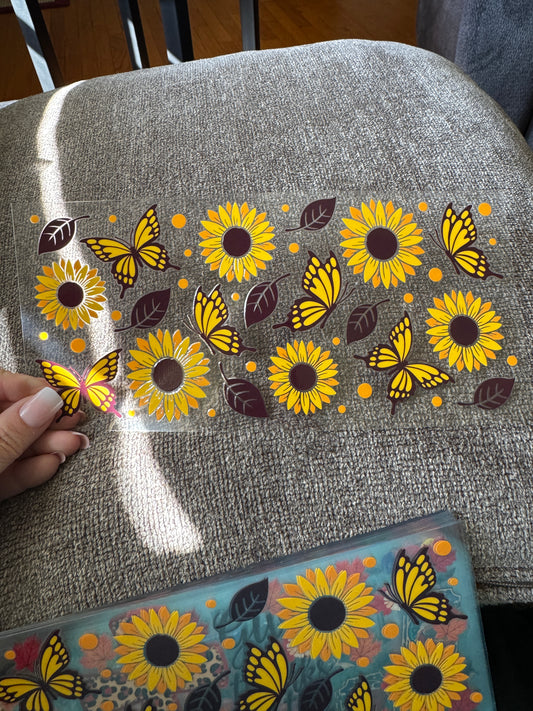 Sunflowers butterflies brown leaves