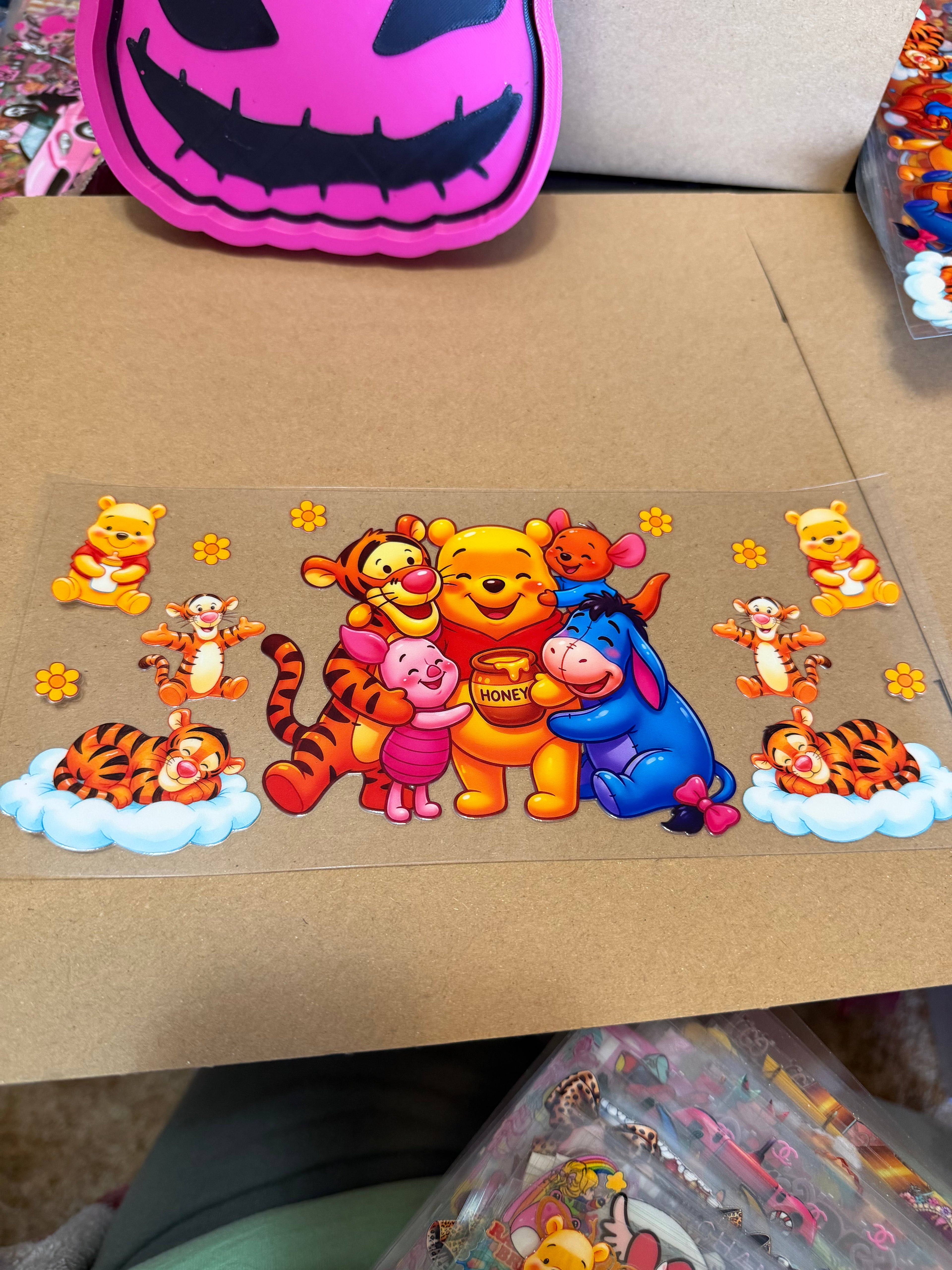 Pooh hugging friends