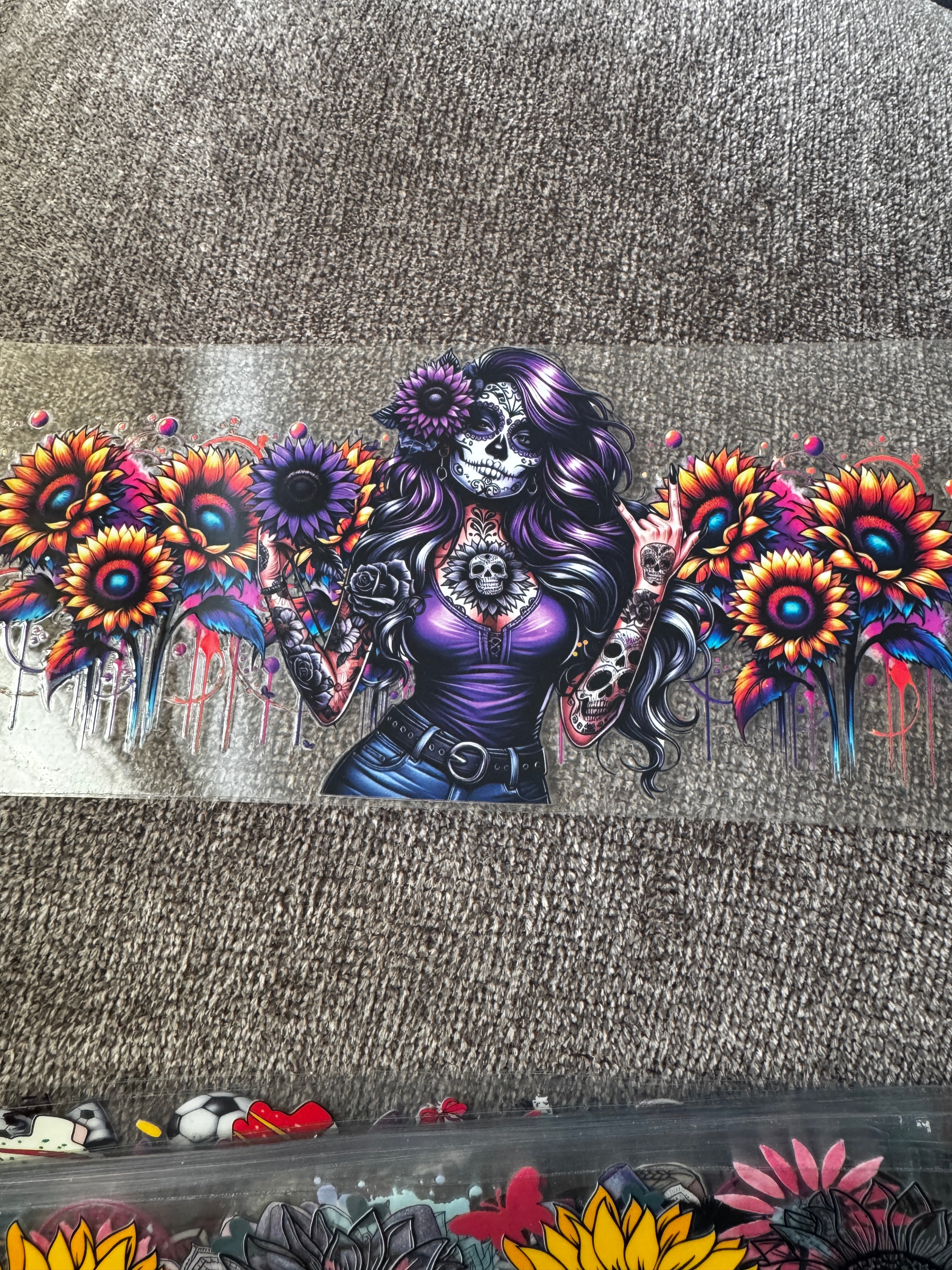 Girl in purple with sunflowers