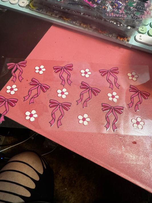 Pink bows white flowers