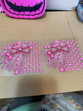 Pink jeweled cross