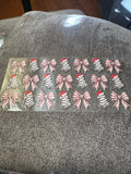 Christmas tree cakes and pink bows