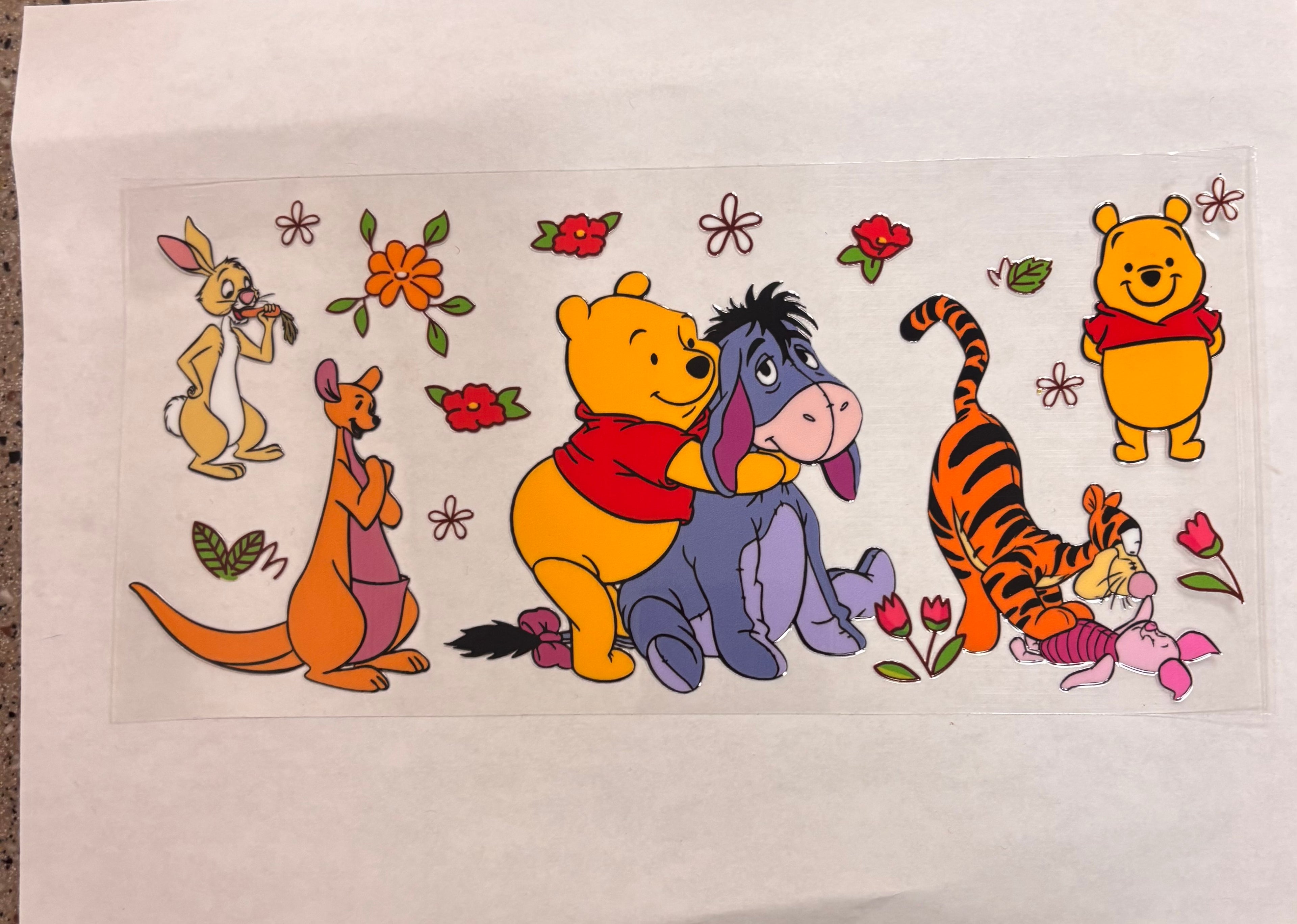 Pooh hugging eeyore